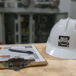 Dilo construction helmet and clipboard